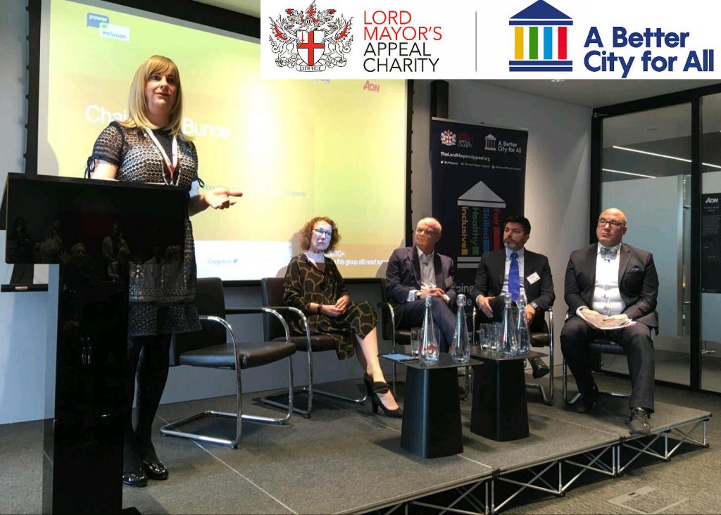 Pips Bunce talking on stage as part of a Lord Mayors Appeal Charity session where Pips Bunce was moderating the panel, with one of the guests being the Lord Major