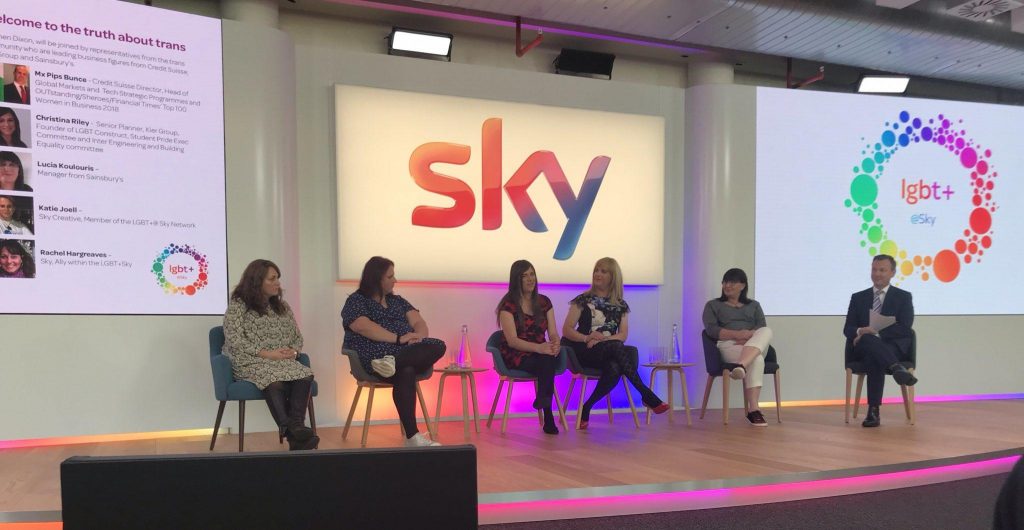 Pips Bunce sitting on stage as part of a panel being hosted at the main Sky headquarters in the UK. The host also on the stage for this session being Stephen Dixon who at the time was Skys main anchor man.