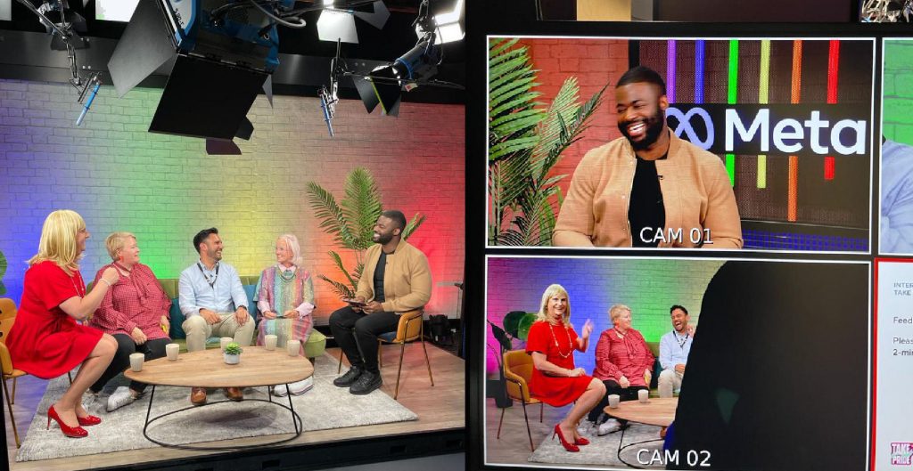 Pips Bunce on the stage of the Meta event recording studio where she is engaged in conversation as part of an event panel, sitting alongside Nancy Kelley (Stonewall CEO), Sophie Neary (now at Google) and Ben Hunt (now news anchor at CNN)